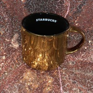 Brand new Starbucks collector gold mug